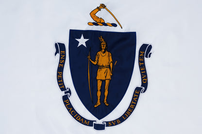 The Massachusetts State Flag by Flag Stars Inc, 100% made in USA, displays a blue shield with a Native American figure, white star, bent arm with sword above, and a Latin motto banner encircling the shield.