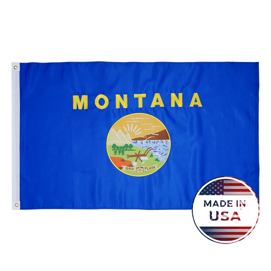 The Montana State Flag by Flag Stars Inc features a circular emblem and "Montana" text on a blue background, detailed with raised embroidery and a "100% Made in USA" badge in the bottom right corner.