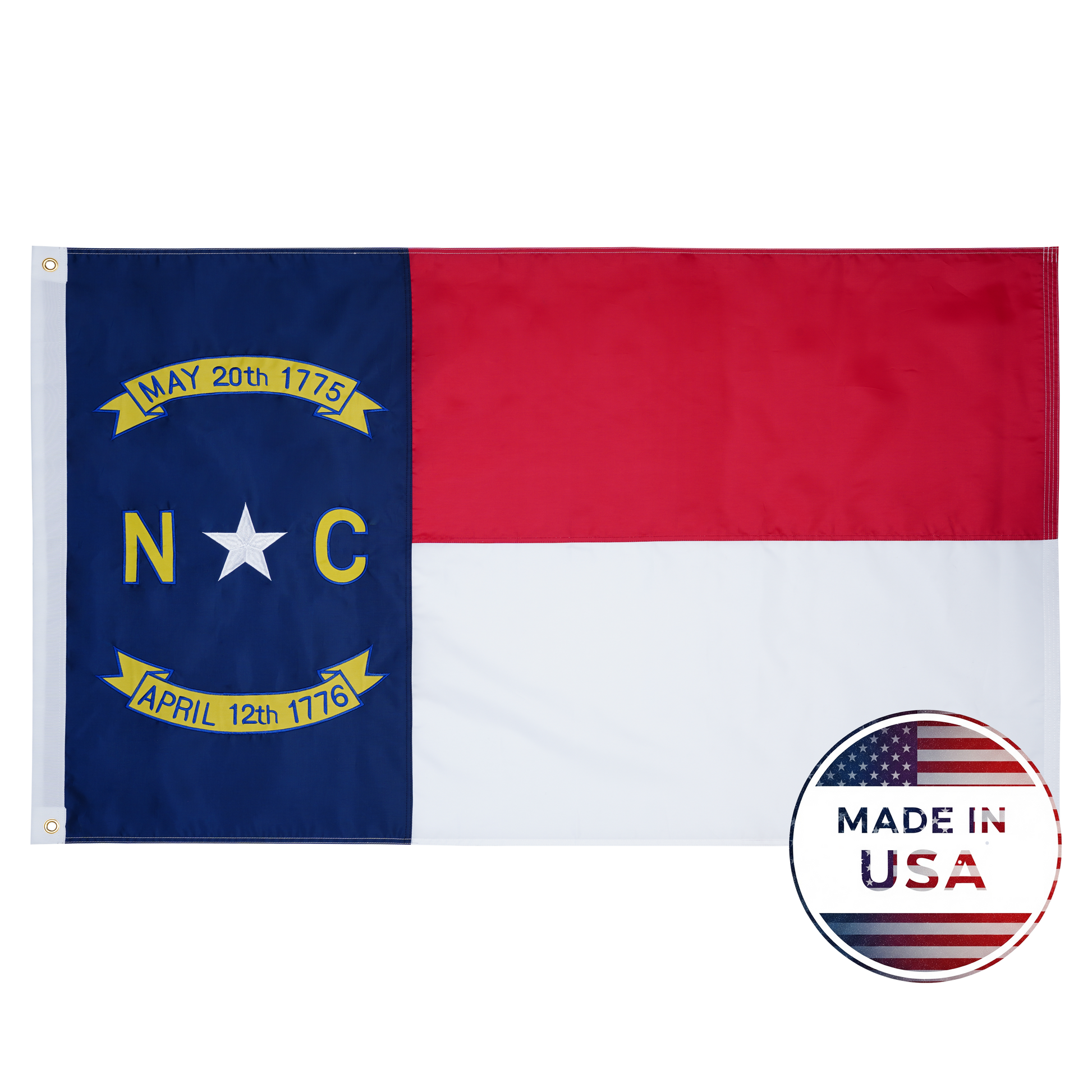The Flag Stars Inc North Carolina State Flag features red, white, and blue panels, two date banners, a white star with raised embroidery for detail, and displays a “100% Made in USA” outdoor-ready badge in the bottom right corner.